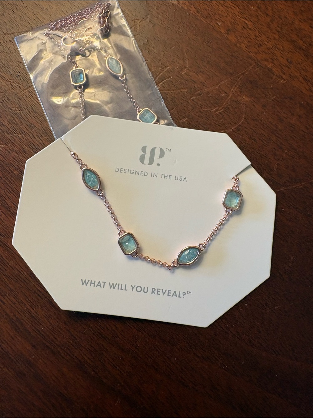 Bomb Party Rose Gold Necklace with Aqua Blue Stone Accents